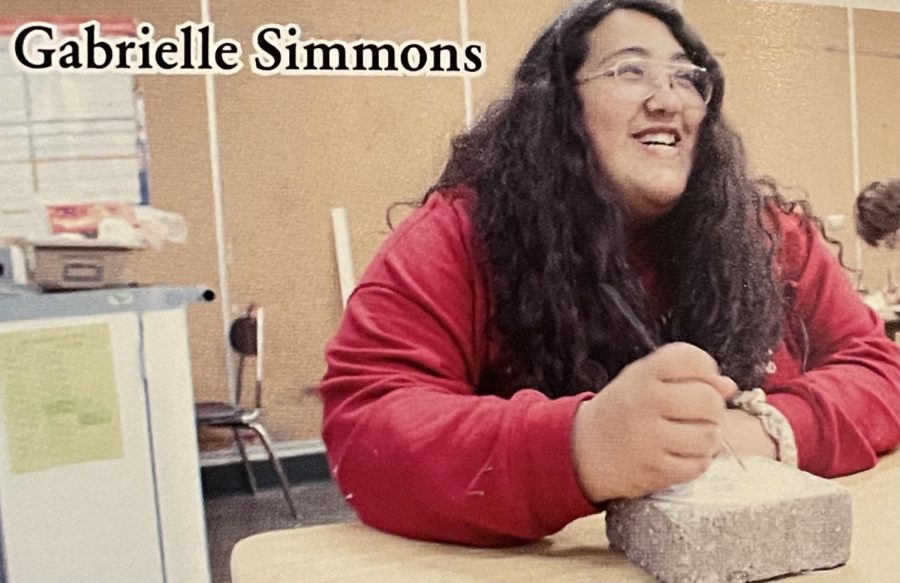 Senior Gabrielle Simmons sculpts during art class.