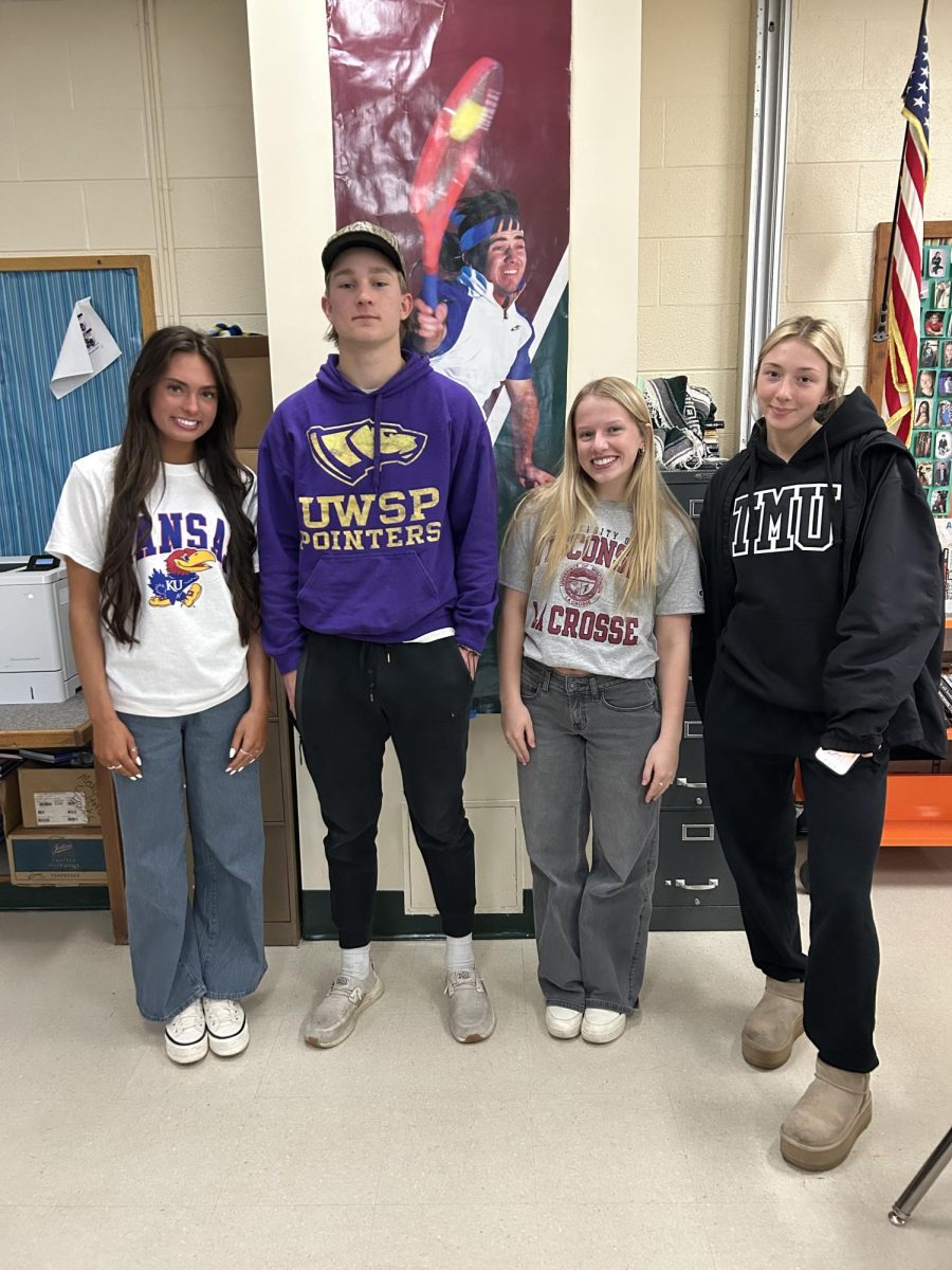 Seniors show off their college choice on decision day