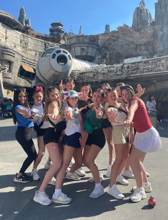 Poms Team Dances In Magic Kingdom Parade